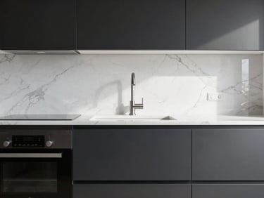 Straight-on architectural shot of a modern kitchen remodel, matte black fixtures, white marble backsplash, clean miter joints, natural light