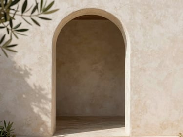 An open minimalist stucco archway leading to a soft, bright courtyard, elegant natural light, 35mm