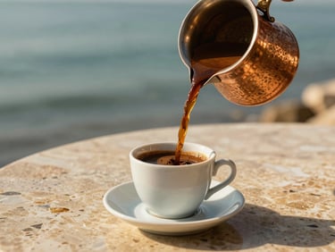 Close-up of a traditional copper pot pouring Turkish coffee into an elegant ceramic cup on a travertine stone table, warm morning sunlight.