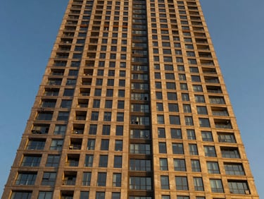 Architectural exterior of Trump Residences Gurugram, distinctive tower, twilight golden hour, sharp focus on facade details.
