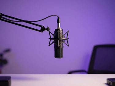 A creator in a moody studio setting, soft purple backlighting, high-end microphone on a boom arm, clean desk visible in the foreground