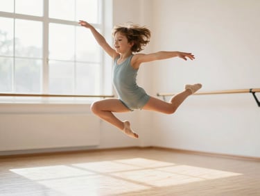 Young child dancer in a bright studio, mid-leap, expressing pure joy, warm natural daylight, dynamic action shot, shallow depth of field.