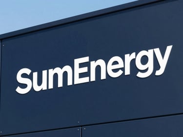 Close-up of a modern, sleek battery storage unit with SumEnergy branding, premium architectural photography, crisp white typography, deep navy background.