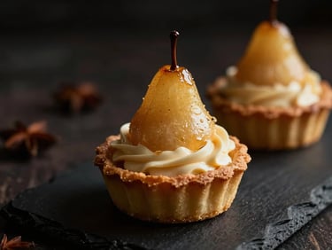 Moody editorial food photography, dramatic low-key side lighting, warm amber tones, extreme shallow depth of field, 35mm. A delicate pear tart with five-spice cream, golden amber tones, on a dark slate board.