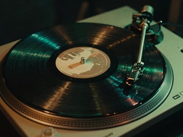 Intimate close-up of a physical vinyl record spinning on a turntable, moody green neon backlights, warm analog texture