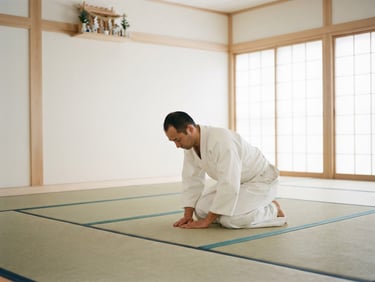 Bright minimalist photography of a clean white dojo, soft natural light, a single practitioner in white keikogi bowing respectfully on the tatami, subtle turquoise accents, 35mm