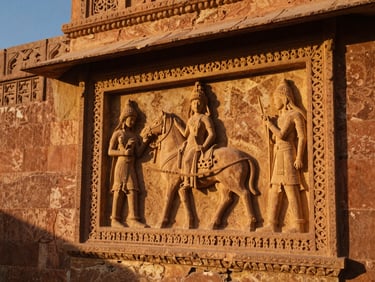 Close-up of intricate sandstone carvings on a historic Jaisalmer Haveli, warm golden hour sunlight.