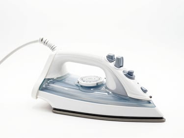 Bright high-key product photography of a premium electric iron with adjustable temperature dial, crisp white background, clean studio lighting, sharp focus, 50mm lens