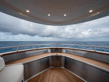 High-end yacht interior, polished teak and brushed steel, crisp industrial studio light, wide-angle lens, sharp details.