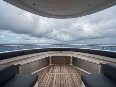 Luxury yacht interior being renovated, high-end teak decking, brushed steel accents, overcast coastal daylight, wide-angle lens, sharp details