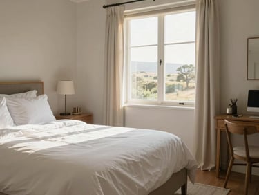 A cozy boutique guest house bedroom in South Africa, warm sunlight streaming through the window, clean white linens, editorial photography