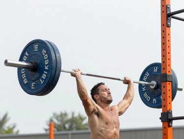 Bright athletic training shot of a heavy barbell being lifted off a rack, chalk dust in the air, high-key natural daylight, sharp focus