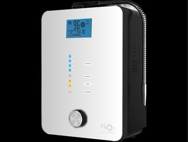 a white alarm clock on a black background