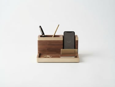 Premium product photography of a single sleek desk organizer on a clean white background, soft diffused studio light, subtle warm gold undertones, sharp 50mm lens, ample negative space.