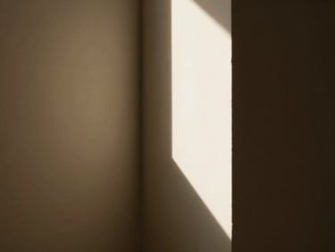 A minimalist architectural detail, a corner where light and shadow meet, evoking introspection and calm.