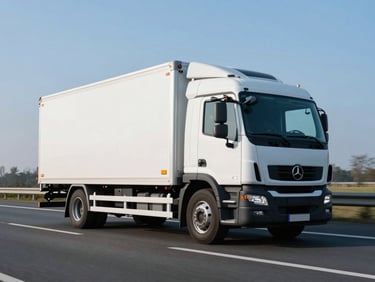 Low-angle dynamic tracking shot of a modern white refrigerated delivery truck in motion on a Dutch highway, crisp morning daylight, cool blue tones, sharp focus