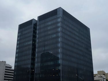 Architectural perspective of a modern financial district building in Santiago, sharp shadows, overcast daylight, 35mm lens
