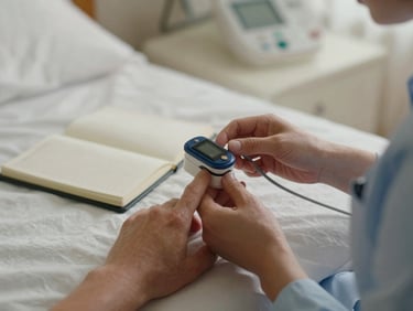 Close-up of a nurse's hands adjusting a pulse oximeter on a patient's finger in a warmly lit bedroom, a small clinical log notebook open nearby on the bedside table — soft morning light, documentary intimacy