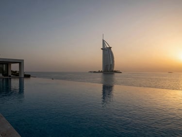 Cinematic wide-angle view of a private villa infinity pool on Palm Jumeirah at golden hour, calm sea, minimalist architectural lines.