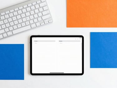 Overhead flat-lay of a clean, highly organized modern workspace with a sleek keyboard, digital planner on a tablet, electric blue and vivid orange color blocks, crisp natural daylight
