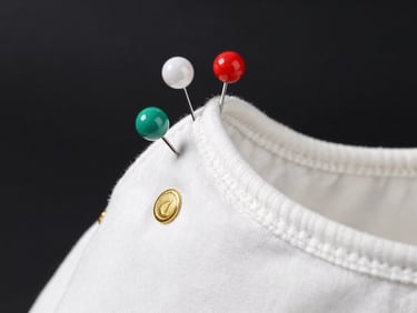 Macro shot of colorful decorative pins being attached to a premium kids babuche, playful yet elegant setting