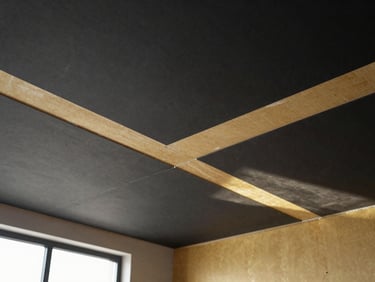 Symmetrical architectural shot of freshly installed gypsum board ceilings, perfect joints, natural light casting sharp shadows, black and gold tones