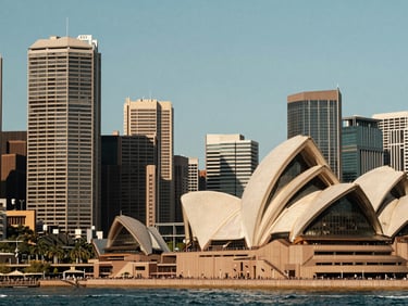 Sweeping cityscape of Sydney harbor with architectural details, warm natural daylight, 35mm lens