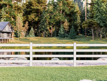 A white vinyl three-rail fence bordering a pond and pine forest landscape near Newark DE