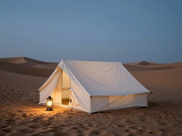 Luxury white canvas tent pitched on a pristine sand dune, warm lantern light glowing from within, vast twilight sky above