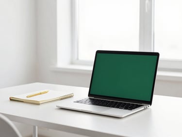 Minimalist workspace with laptop, notebook, gold accents, bright daylight through a window, professional editorial