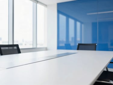 Bright editorial daylight shot of a modern glass boardroom in Dubai, clean white and blue tones, shallow depth of field