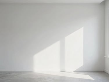 Minimalist modern interior with clean lines, soft window light casting gentle shadows, high-end real estate photography, 35mm