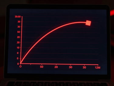 High-contrast digital diagram of a diesel engine torque curve on a laptop screen, glowing red graphics, dark background, sharp focus