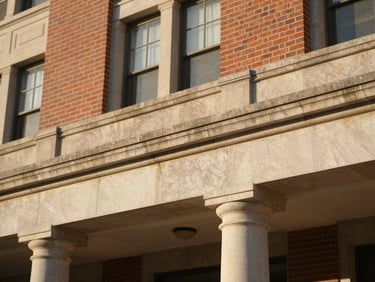 Architectural detail of a local Florida courthouse facade, warm natural light, brick and stone textures, shallow depth of field