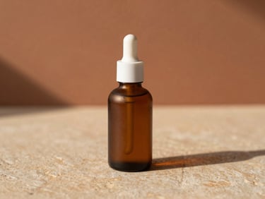 Macro shot of premium organic personal care bottle on a warm stone surface, soft shadows, terracotta background.