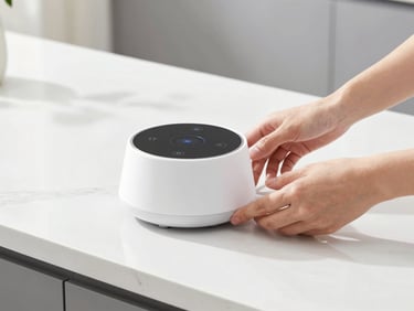 Hands adjusting a smart kitchen gadget on a white marble counter, bright natural light, crisp studio setting, sharp focus, 50mm lens