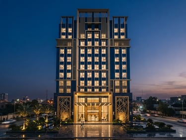 A premium corporate office facade in Baghdad, sharp architectural lighting, deep navy and brushed gold tones, clean composition, 35mm