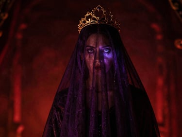 A regal queen shrouded in dark violet veils, eyes glowing with faint magic under a tarnished gold tiara, low-key lighting.