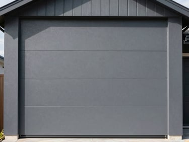 Straight-on architectural detail of a modern home exterior wall with a fresh, uniform dark gray protective coating, sharp shadow lines, bright daylight