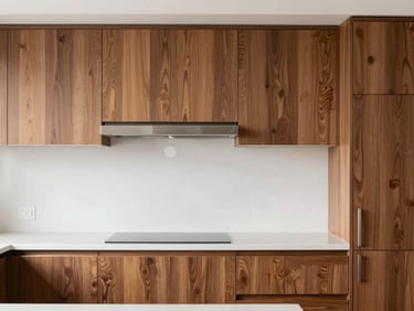 Crisp architectural photography of a modern kitchen remodel, bright natural daylight, walnut cabinets, clean geometric composition.