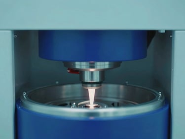 macro shot of automated plasma fractionation machinery, cool clinical lighting, teal and royal blue accents, 35mm