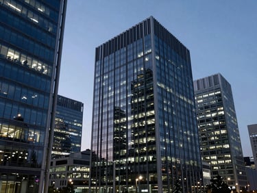 Wide-angle cool-toned shot of modern architectural financial district at twilight, sharp office lighting reflecting on glass facades, 35mm