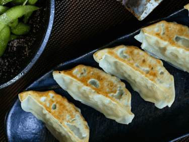 a plate of several vegan dumplings