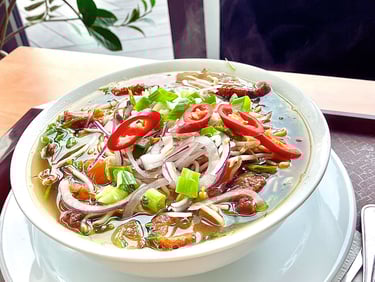 a bowl of soup with vegetables