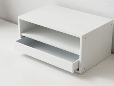 Bright high-key product photography of a sleek minimalist desk organizer with clean lines, soft natural daylight, sharp details, 35mm lens