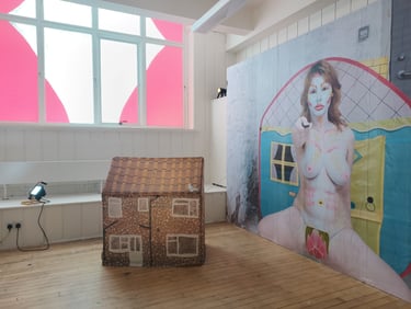 Exhibition view of three art pieces.