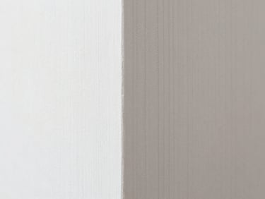 Macro shot of a perfectly aligned wallpaper seam, showing intricate pattern matching and no visible edges, natural daylight.