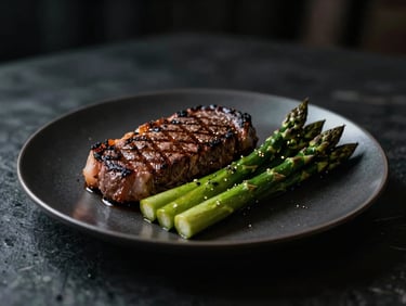 Moody cinematic photography of a clean high-protein meal with grilled steak and asparagus on a dark plate, dramatic side light, 35mm.