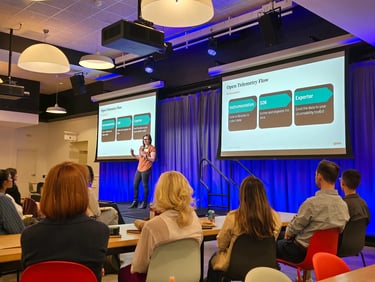 Mindi speaking in front of the Gusto Lightning Talks for Women and Folks in Tech Denver event on Apr