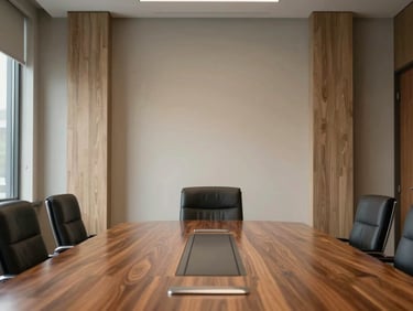 An executive boardroom in Spokane, bespoke faux-finished columns and polished wood table.
